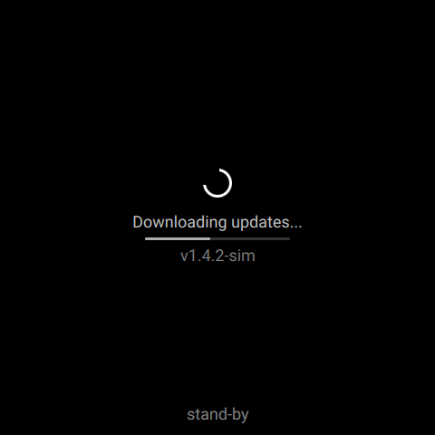 Black standby screen reading Downloading updates with a version number and the word stand-by